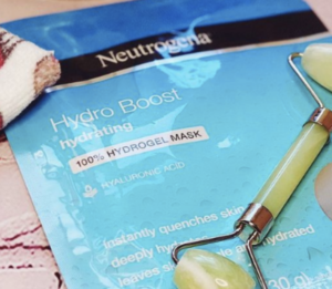 Close Up Image of The Neutrogena Hydro Boost Hydrating Hydrogel Mask and Facial Roller