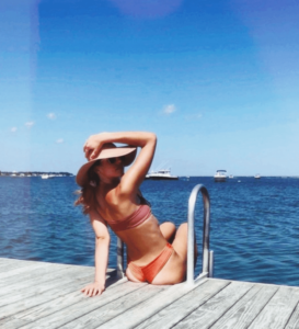 Maddie In B. Swim bathing suit and Sun Hat On a Dock