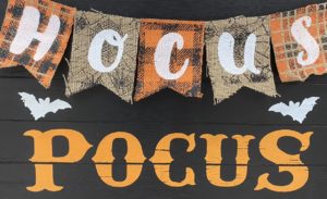 IMAGE OF a sign that says Hocus Pocus 