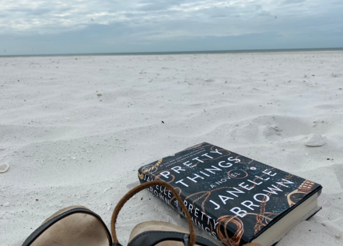 Image of a book in the sand